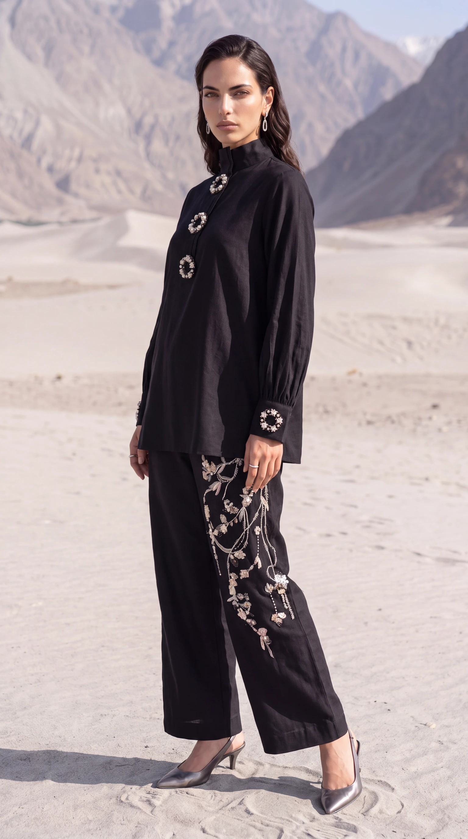 Side view of Obsidian Halo showing its relaxed top and cropped wide trousers